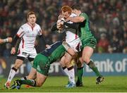 26 December 2014; Peter Nelson, Ulster, is tackled by Tom McCartney, left, and Willie Faloon, Connacht. Guinness PRO12, Round 11, Ulster v Connacht, Kingspan Stadium, Ravenhill Park, Belfast, Co. Down. Picture credit: Oliver McVeigh / SPORTSFILE