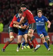 26 December 2014; Ian Madigan, Leinster, is tackled by Donncha O'Callaghan, left, Billy Holland, Munster. Guinness PRO12, Round 11, Munster v Leinster, Thomond Park, Limerick. Picture credit: Diarmuid Greene / SPORTSFILE