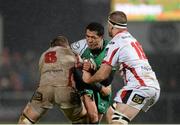 26 December 2014; Mils Muliaina, Connacht, is tackled by Roger Wilson, left, and Alan O'Connor, Ulster. Guinness PRO12, Round 11, Ulster v Connacht, Kingspan Stadium, Ravenhill Park, Belfast, Co. Down. Picture credit: Oliver McVeigh / SPORTSFILE