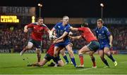 26 December 2014; Darragh Fanning, Leinster, is tackled by Andrew Conway, left, Duncan Casey and Felix Jones, right, Munster. Guinness PRO12, Round 11, Munster v Leinster, Thomond Park, Limerick. Picture credit: Brendan Moran / SPORTSFILE