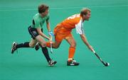 21 August 2007; Jeroen Delmee, Netherlands, in action against Phelie Maguire, Ireland. 2007 EuroHockey Nations Championships, Mens, Pool B, Ireland v Netherlands, Belle Vue Hockey Centre, Kirkmanshulme Lane, Belle Vue, Manchester, England. Picture credit: Pat Murphy / SPORTSFILE