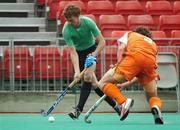 21 August 2007; Phelie Maguire, Ireland, in action against Geert-Jan Derik, Netherlands. 2007 EuroHockey Nations Championships, Mens, Pool B, Ireland v Netherlands, Belle Vue Hockey Centre, Kirkmanshulme Lane, Belle Vue, Manchester, England. Picture credit: Pat Murphy / SPORTSFILE