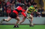 31 October 1999; Alan Cummins of Blackrock gets away from Pat Mahon of UCC during the Cork County Senior Club Hurling Championship Final match between Blackrock and UCC at Páirc Uí Chaoimh in Cork. Photo by Brendan Moran/Sportsfile
