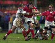 15 January 2000; Anthony Foley of Munster is tackled by John Bryant of Pontypridd during the Heineken Cup Pool 4 Round 6 match between Pontypridd and Munster at Sardis Road in Pontypridd, Wales. Photo by Matt Browne/Sportsfile