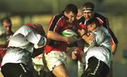 20 November 1999; Anthony Foley of Munster in action against Will James, left, and Sven Cronk of Pontypridd during the Heineken Cup Pool 4 Round 1 match between Munster and Pontypridd at Thomond Park in Limerick. Photo by Ray Lohan/Sportsfile