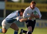 28 December 1999; Anthony Horgan of Cork Constitution is tackled by Tom Tierney of Garryowen during AIB Rugby League Division 1 match between Cork Constitution and Garryowen at Temple Hill in Cork. Photo by Brendan Moran/Sportsfile