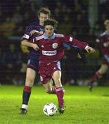 7 January 2000; Aubrey Dolan of Galway United in action against Donal Broughan of St Patrick's Athletic during the FAI Harp Cup Second Round match between Galway United and St Patrick's Athletic at Terryland Park in Galway. Photo by Ray Lohan/Sportsfile