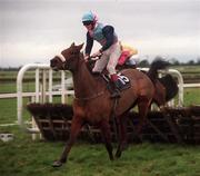 16 January 2000; Banreme, with Joey Elliott up, lands ahead of Belle Star (SP Kelly) on his way to winning the Teal Handicap Hurdle at Fairyhouse Racecourse in Meath. Photo by Ray McManus/Sportsfile