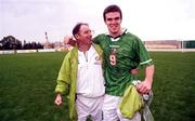 24 November 1999; Goalscorer Ben Burgess of Republic of Ireland celebrates with his manager Brian Kerr after the UEFA Under-18 Championship Preliminary Round match between Malta and Republic of Ireland at Hibernians Football Ground in Paola, Malta. Photo by David Maher/Sportsfile
