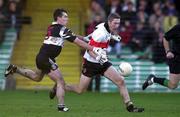 12 December 1999; Billy Sheehan of UCC in action against Declan Conway of Doonbeg during the AIB Munster Senior Club Football Championship Final match between UCC and Doonbeg at the Gaelic Grounds in Limerick. Photo by Brendan Moran/Sportsfile
