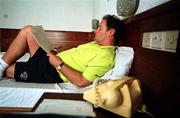 2 April 1999; Manager Brian Kerr checks over his notes in the Premier Hotel after a Republic of Ireland U20 Squad training sesssion at the Liberty Stadium in Ibadan, Nigeria. Photo by David Maher/Sportsfile