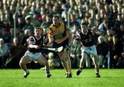 24 October 1999; Christy Chaplin of Sixmilebridge in action against Jamesie O'Connor, left, and Andrew Whelan of St Joseph's Doora Barefield during the Clare County Senior Club Hurling Championship Final match between Sixmilebridge and St Joseph's Doora Barefield at at Hennessy Park, Miltown Malbay, Clare. Photo by Damien Eagers/Sportsfile