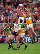 15 June 1997; Ciarán McManus of Offaly jumps for a high ball with Raymond Danne of Wicklow during the Bank of Ireland Leinster Senior Football Championship Quarter-Final match between Wicklow and Offaly at Croke Park in Dublin. Photo by David Maher/Sportsfile