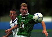 25 July 1999; Gary Doherty of Republic of Ireland in action with Evangelos Nastos of Greece during the 1999 UEFA European Under 18 Championship Third Place Play-Off match between Greece and Republic of Ireland at Folkungavallen Stadium in Linkoping, Sweden. Photo by David Maher/Sportsfile