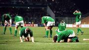 20 October 1999; Ireland players dejected after the 1999 Rugby World Cup Quarter-Final Play-Off match between Argentina and Ireland at Stade Felix Bollaert in Lens, France. Photo by Matt Browne/Sportsfile