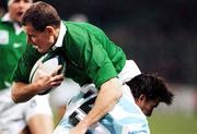20 October 1999; Matt Mostyn of Ireland is tackled by Ignacio Corletto of Argentina during the 1999 Rugby World Cup Quarter-Final Play-Off match between Argentina and Ireland at Stade Felix Bollaert in Lens, France. Photo by Brendan Moran/Sportsfile