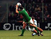 20 October 1999; Dion O'Cuinneagain of Ireland is tackled by Ganzalo Quesada of Argentina during the 1999 Rugby World Cup Quarter-Final Play-Off match between Argentina and Ireland at Stade Felix Bollaert in Lens, France. Photo by Matt Browne/Sportsfile