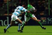 20 October 1999; Andy Ward of Ireland is tackled by Lisandro Arbizu of Argentina during the 1999 Rugby World Cup Quarter-Final Play-Off match between Argentina and Ireland at Stade Felix Bollaert in Lens, France. Photo by Brendan Moran/Sportsfile