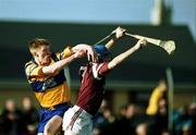 24 October 1999; Niall Gilligan of Sixmilebridge in action against Donal Cahill of St Joseph's Doora Barefield   during the Clare County Senior Club Hurling Championship Final match between Sixmilebridge and St Joseph's Doora Barefield at at Hennessy Park, Miltown Malbay, Clare. Photo by Damien Eagers/Sportsfile