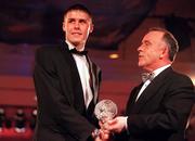 20 Feburary 2000; Stephen McCarthy is presented with his U15 player of the year award by FAI President Pat Quigley at the FAI/ OPEL International Soccer Awards Banquet 1999 at the Burlington Hotel in Dublin. Photo by David Maher/Sportsfile