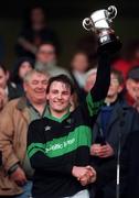 17 March 1994; Nemo Rangers captain, Stephen O'Brien, lifts the Andy Merrigan Cup after the All-Ireland Senior Club Football Championship Final match between Nemo Rangers and Castlebar Mitchels at Croke Park in Dublin. Photo by Ray McManus/Sportsfile