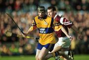 24 October 1999; Stiofán Fitzpatrick of Sixmilebridge in action against Ger Hoey of St Joseph's Doora Barefield during the Clare County Senior Club Hurling Championship Final match between Sixmilebridge and St Joseph's Doora Barefield at at Hennessy Park, Miltown Malbay, Clare. Photo by Damien Eagers/Sportsfile