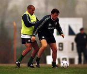 16 November 1999; Tony Cascarino shields the ball from Curtis Fleming during a Republic of Ireland training session at Veledrom Stadium in Bursa, Turkey. Photo by Brendan Moran/Sportsfile *** Local Caption ***