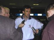 18 November 1999; Tony Cascarino talking to journalists after he announced his retirement from international football with Republic of Ireland at Istanbul Airport in Turkey. Photo by David Maher/Sportsfile