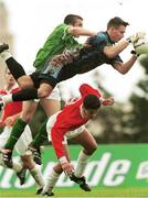 24 November 1999; Malta goalkeeper Justin Haber, supported by team-mate Julian Briffa, gathers possession ahead of Liam Miller of Republic of Ireland during the UEFA Under-18 Championship Preliminary Round match between Malta and Republic of Ireland at Hibernians Football Ground in Paola, Malta. Photo by David Maher/Sportsfile