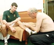 4 April 1999; Team doctor Dr Ronan O'Callaghan tends to Jason Gavin in the team hotel before the 1999 FIFA World Youth Championship Group C Round 1 match between Mexico and Republic of Ireland at the Liberty Stadium in Ibadan, Nigeria. Photo by David Maher/Sportsfile