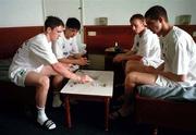 2 April 1999; Republic of Ireland players, from left, Richie Baker, Paul Donnolly, Thomas Heery, and Barry Ferguson play cards in the Premier Hotel after a Republic of Ireland U20 Squad training sesssion at the Liberty Stadium in Ibadan, Nigeria. Photo by David Maher/Sportsfile