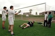 1 April 1999; Goalkeeping coach Declan McIntyre with goalkeepers Alex O'Reilly, left, and Dean Delaney, as local schoolboys look on, during a Republic of Ireland U20 Squad training sesssion at the Liberty Stadium in Ibadan, Nigeria. Photo by David Maher/Sportsfile