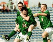 10 April 1999; Richard Sadlier of Republic of Ireland, 14, celebrates scoring his side's first goal with team-mates Robbie Keane and Barry Quinn, right, during the 1999 FIFA World Youth Championship Group C Round 3 match between Australia and Republic of Ireland at the Liberty Stadium in Ibadan, Nigeria. Photo by David Maher/Sportsfile