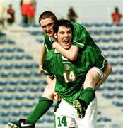 10 April 1999; Richard Sadlier of Republic of Ireland, 14, celebrates scoring his side's first goal with team-mate Robbie Keane during the 1999 FIFA World Youth Championship Group C Round 3 match between Australia and Republic of Ireland at the Liberty Stadium in Ibadan, Nigeria. Photo by David Maher/Sportsfile