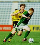 10 April 1999; Damien Duff of Republic of Ireland in action against Vinecenzo Grella of Australia during the 1999 FIFA World Youth Championship Group C Round 3 match between Australia and Republic of Ireland at the Liberty Stadium in Ibadan, Nigeria. Photo by David Maher/Sportsfile