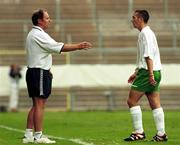 23 July 1999; Liam Miller of Republic of Ireland walks towards his manager Brian Kerr after he was sent off for a second bookable offence during the 1999 UEFA European Under 18 Championship Group B Round 3 match between Republic of Ireland and Italy at Idrottsparken Stadium in Norrkoping, Sweden. Photo by David Maher/Sportsfile