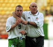 23 July 1999; Republic of Ireland assistant coach Noel O'Reilly consoles Gerry Crossley after the 1999 UEFA European Under 18 Championship Group B Round 3 match between Republic of Ireland and Italy at Idrottsparken Stadium in Norrkoping, Sweden. Photo by David Maher/Sportsfile
