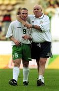 23 July1999; Republic of Ireland assistant coach Noel O'Reilly consoles Gerry Crossley after the 1999 UEFA European Under 18 Championship Group B Round 3 match between Republic of Ireland and Italy at Idrottsparken Stadium in Norrkoping, Sweden. Photo by David Maher/Sportsfile