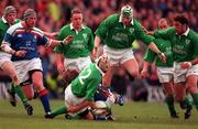 4 March 2000; Mike Mullins of Ireland, supported by team-mates Simon Easterby and Kieron Dawon, right, during the Lloyds TSB 6 Nations match between Ireland and Italy at Lansdowne Road in Dublin. Photo by Damien Eagers/Sportsfile