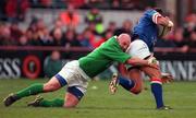 4 March 2000; Luca Martin of Italy is tackled by Keith Wood of Ireland during the Lloyds TSB 6 Nations match between Ireland and Italy at Lansdowne Road in Dublin. Photo by Brendan Moran/Sportsfile