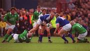 4 March 2000; Denis Dallon of Italy prepares to pass to team-mate Matthew Pini, 15, while tackled by Keith Wood of Ireland during the Lloyds TSB 6 Nations match between Ireland and Italy at Lansdowne Road in Dublin. Photo by Brendan Moran/Sportsfile