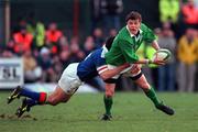 4 March 2000; Brian O'Driscoll of Ireland is tackled by Juan Sebastian Francesio of Italy during the Lloyds TSB 6 Nations match between Ireland and Italy at Lansdowne Road in Dublin. Photo by Brendan Moran/Sportsfile