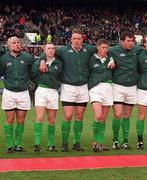 4 March 2000; Ireland players, from left, Mike Mullins, Peter Stringer, Mick Galwey, Ronan O'Gara, and Anthony Foley stand for the National Anthems before the Lloyds TSB 6 Nations match between Ireland and Italy at Lansdowne Road in Dublin. Photo by Brendan Moran/Sportsfile
