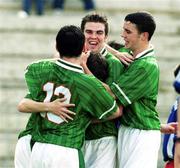 22  November 1999; Graham Barrett of Republic of Ireland, centre, head down, celebrates with team-mates  Keith Foy, left, Ben Burgess and John O'Shea, after scoring the first of his two goals during the UEFA Under 18 Championship Preliminary Round match between Republic of Ireland and Liechenstein at the National Stadium in Ta' Qali, Malta. Photo by David Maher/Sportsfile