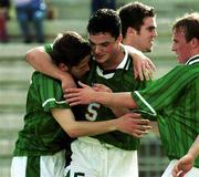 22nd  Nov 1999; Graham Barrett of Republic of Ireland, left, celebrates with team-mates Jim Goodwin and Thomas Butler after scoring the second of his two goals during the UEFA Under 18 Championship Preliminary Round match between Republic of Ireland and Liechenstein at the National Stadium in Ta' Qali, Malta. Photo by David Maher/Sportsfile