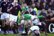 19 February 2000; Peter Stringer of Ireland is tackled by Brian Redpath, 9, of Scotland during the Lloyds TSB 6 Nations match between Ireland and Scotland at Lansdowne Road in Dublin. Photo by Brendan Moran/Sportsfile