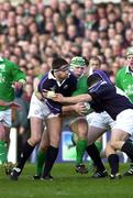 19 February 2000; Scott Murray of Scotland is tackled by Simon Easterby of Ireland during the Lloyds TSB 6 Nations match between Ireland and Scotland at Lansdowne Road in Dublin. Photo by Brendan Moran/Sportsfile