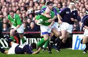 19 February 2000; Keith Wood of Ireland is tackled by Scott Murray of Scotland during the Lloyds TSB 6 Nations match between Ireland and Scotland at Lansdowne Road in Dublin. Photo by Brendan Moran/Sportsfile