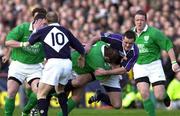 19 February 2000; Peter Clohessy of Ireland is tackled by Martin Leslie of Scotland during the Lloyds TSB 6 Nations match between Ireland and Scotland at Lansdowne Road in Dublin. Photo by Brendan Moran/Sportsfile