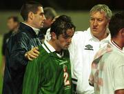 4 September 1999; Stephen Carr of Republic of Ireland is consoled by Mark Kennedy, left, and Séamus McDonagh after the UEFA European Championships Qualifying Group 8 match between Croatia and Republic of Ireland at Maksimir Stadium in Zagreb, Croatia. Photo by David Maher/Sportsfile
